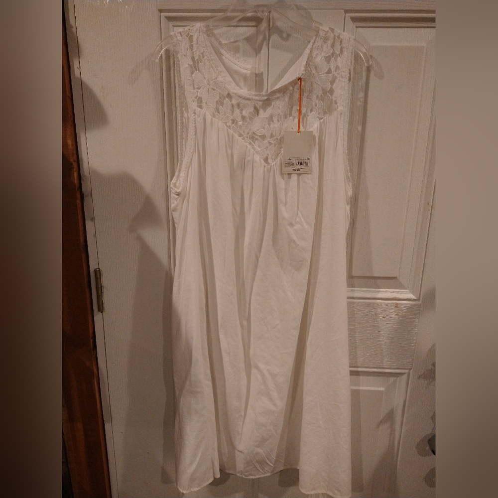 Dress. Tie string in front with tassels. 40 x 22